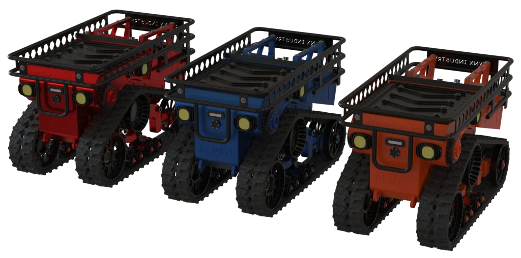 Trois robots REMBO de Sfynx Industry, plateformes compactes chenillées en versions rouge, bleue et orange, conçues pour le transport, la manutention et les opérations logistiques en environnement difficile.